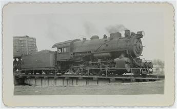 (TRAINS--PENNSYLVANIA RAILROAD) A binder assembled by the artist Lewis Smith with approximately 280 snapshots of steam locomotives.